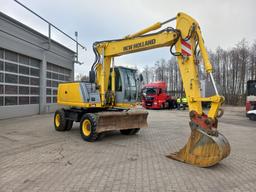 Koparka kołowa New Holland MH Plus na wynajem