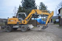 Zdjęcie Liebherr 311 na wynajem w Rentools